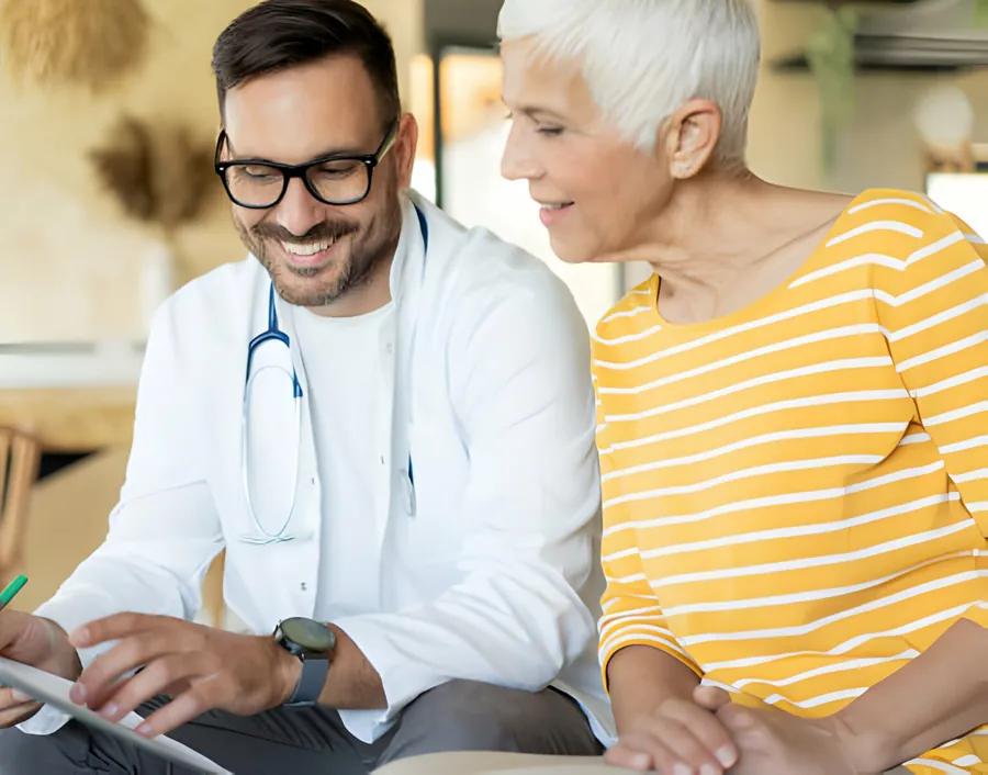 A doctor talking with a patient