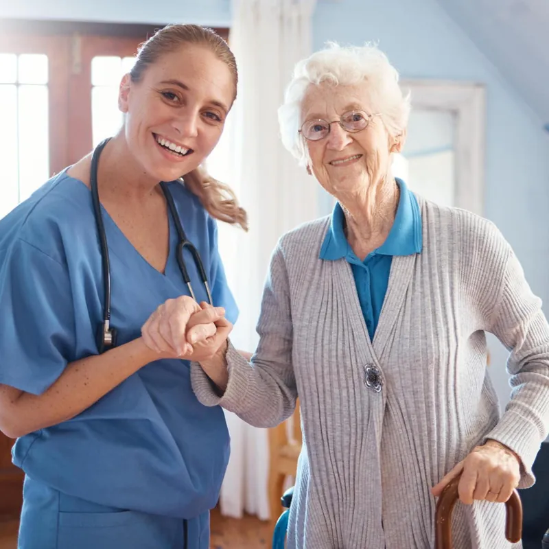 A caregiver walking with a senior